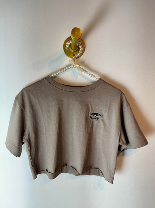 Cropped beige t-shirt with embroidered Eye of Horus on chest, minimalist handmade tee